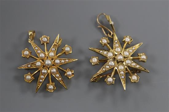 Two Edwardian 15ct gold and seed pearl set starburst pendant brooches, gross 8.2 grams.